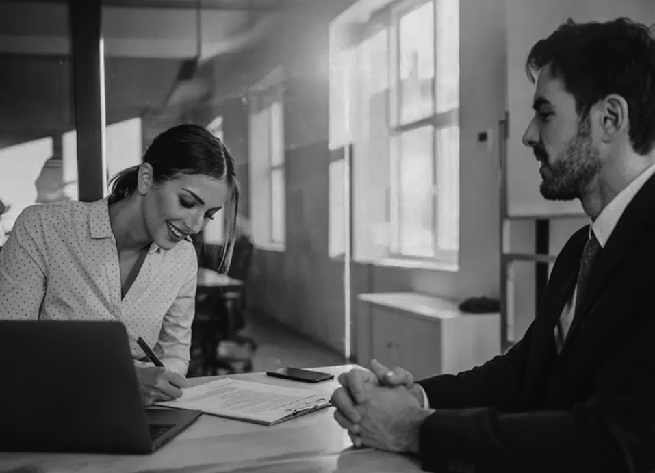 black and white image of business meeting